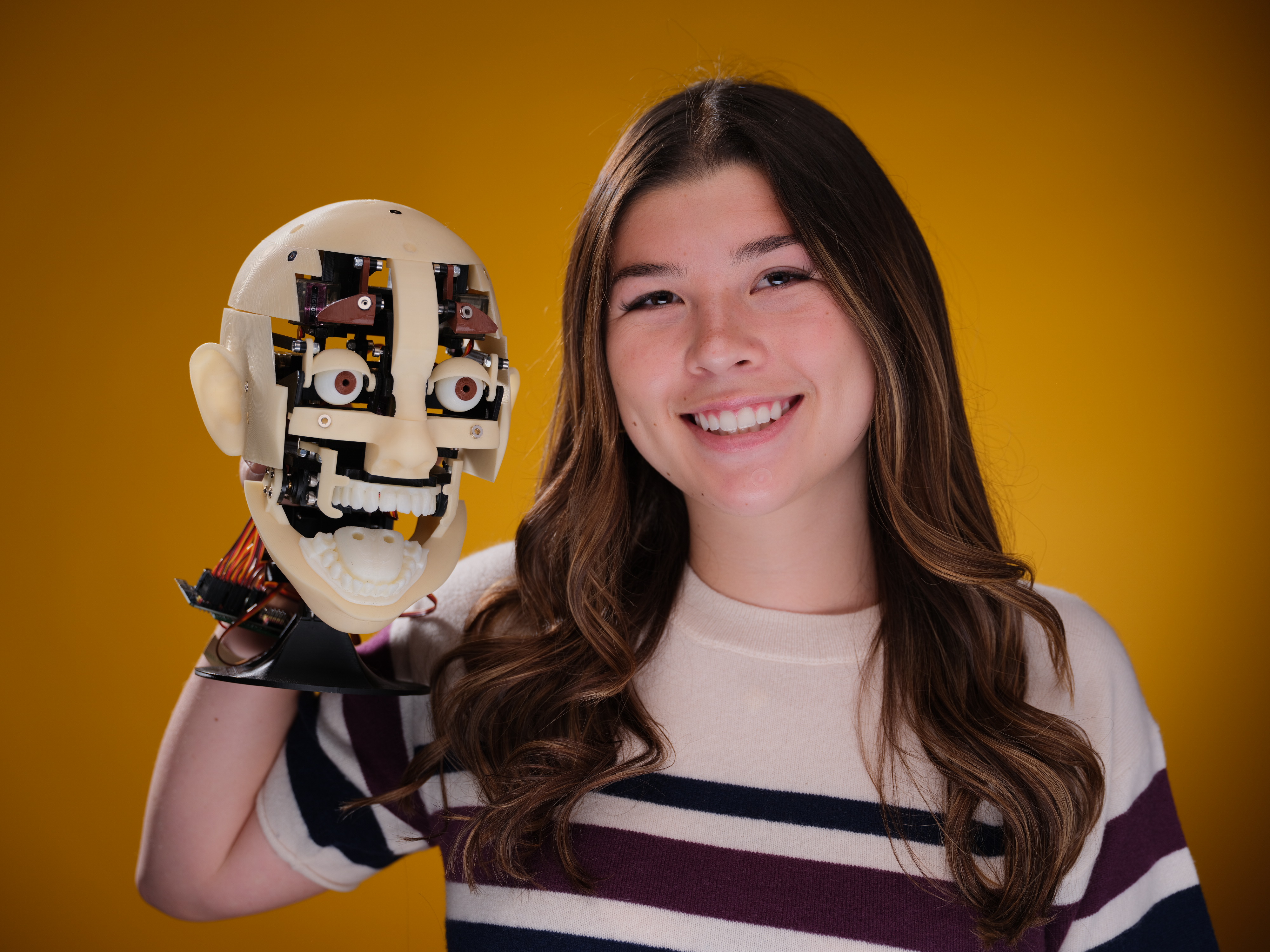 Hayley Bloch holding the Animatronic Head V3